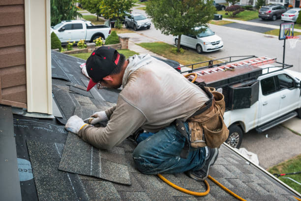Professional Flat Roof Repair technician working in Westphalia, MI
